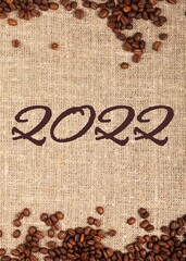 Canvas Print - 2022 and aroma coffee beans on the desk