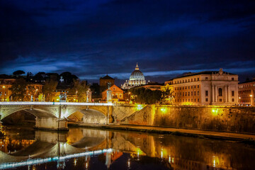 Wall Mural - View of the Victor Emmanuel bridge and St. Peter's Cathedral in the evening. Rome, Lazio, Italy