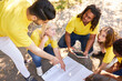 © Robert Kneschke - Young team on the treasure hunt at the geocaching game