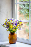 Fototapeta Tulipany - field simple flowers in a vase on the window, summer day, cozy house