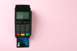 © New Africa - New modern payment terminal with credit card on pink background, top view. Space for text