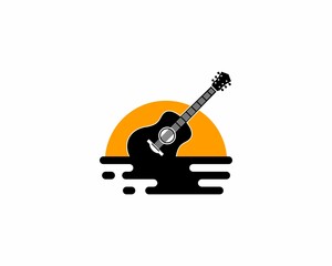 Wall Mural - Guitar silhouette in the sunset scenery logo