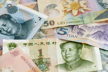 Wall Mural - romanian currency leu ron and chinese renminbi yuan banknotes global trade exchange concept