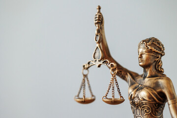 the symbol of justice and justice is a statuette of the goddess themis judge's gavel. legal advice a