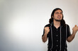 © Antonio Tanaka - portrait of a very angry, furious and upset hispanic man on a white background