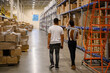 © Raymond Forbes LLC/Stocksy - Warehouse worker occupation