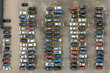 © Yaroslav Danylchenko/Stocksy - View from drone on parking with many cars