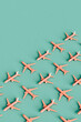 © Giada Canu/Stocksy - Pink Commercial airplane jetliner. copy space.