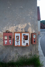 Broken Vending Machines Hanging On A Wall