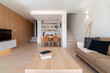 © Bisual Studio/Stocksy - Spacious living room in house