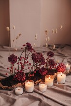 Beautiful Composition With Red Flowers And Candles