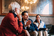 © Studio Firma/Stocksy - Businesspeople in Restaurant