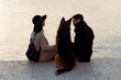 © Mauro Grigollo/Stocksy - Back view of a couple with a dog