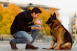 © Mauro Grigollo/Stocksy - Man having fun with his dog