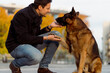 © Mauro Grigollo/Stocksy - Man and dog together