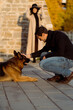 © Mauro Grigollo/Stocksy - Couple outdoor with the dog