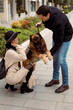 © Mauro Grigollo/Stocksy - Couple with a dog