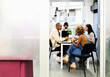 © Guille Faingold/Stocksy - Diverse colleagues during lunch