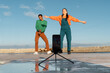 © Alba Vitta/Stocksy - Cool friends dancing and recordin with phone