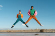 © Alba Vitta/Stocksy - Cool friends listening to music and dancing