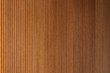 © Luciano Spinelli/Stocksy - Detail of a wooden wall with a linear relief and texture