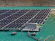 © Adam Sébire/Stocksy - Floating solar power, renewable green energy technology