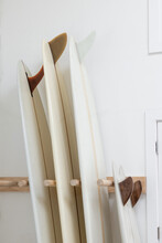 Vintage Surf Boards In Wooden Rack