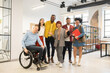 © Hernandez & Sorokina/Stocksy - Group Photo At Office