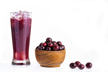 Wall Mural - Euterpe oleracea - Refreshing drink from the organic acai berry