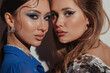© Liliya Rodnikova/Stocksy - Fashionable women with stylish makeup looking at camera