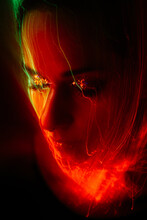 Close-up Of A Woman's Face With Light Painting