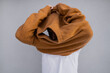 © Olga Kozicka/Stocksy - Pulling Sweater Over Head