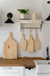 © Alba Vitta/Stocksy - Handmade wooden cutting boards in kitchen