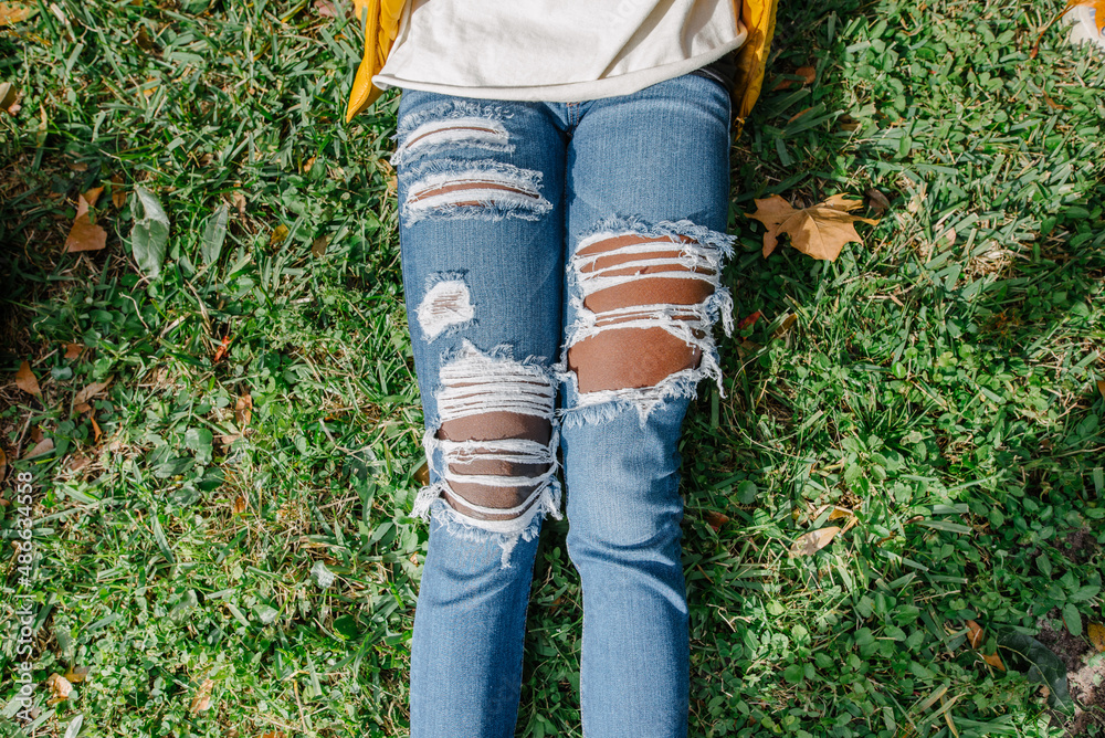 Ripped jeans Stock Photo | Adobe Stock