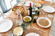 © Ivan Gener/Stocksy - Food sitting on a table for a meal