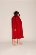 © Ulas&Merve/Stocksy - red coat