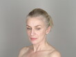 © rolfo/Stocksy - Thoughtful adult model on gray