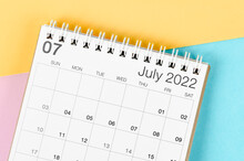 July 2022 Desk Calendar On Multicolored Background.