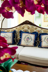 Wall Mural - Detail image of Pillows on an antique luxury sofa