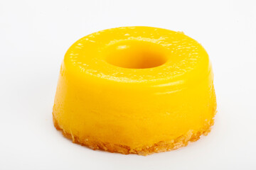 Wall Mural - egg yolk candy with sugar, typical of Brazil and Portugal, called Quindim or Brisa de Liz.