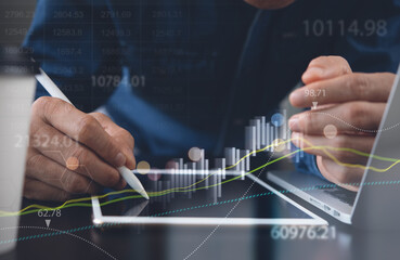 Wall Mural - Businessman using digital tablet analyzing sales data and economic growth graph, marketing report, financial chart. Business strategy analysis