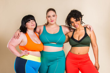 Plus size women posing for body acceptance