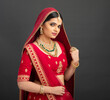 Beautiful Indian young Hindu Bride in studio shot	