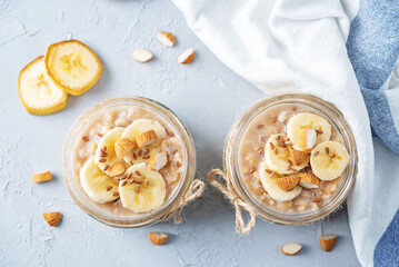 Wall Mural - Banana flax seeds overnight oats with banana slices and almonds