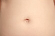 navel with skin of asian kid.