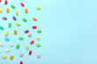 Different jelly beans on blue background