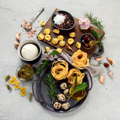 Sticker - Italian pasta assortment on light background.