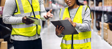 Portrait Two African American Engineer Team Shipping Order Detail On Tablet Check Goods And Supplies On Shelves With Goods Inventory In Factory Warehouse.logistic Industry And Business Export