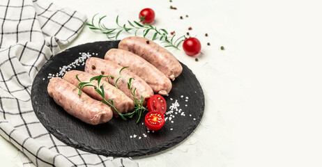 Wall Mural - Raw sausages with herbs and spices. Ketogenic diet, vertical image. top view. place for text