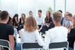 © ASDF - close up. group of young people sitting in a circle.